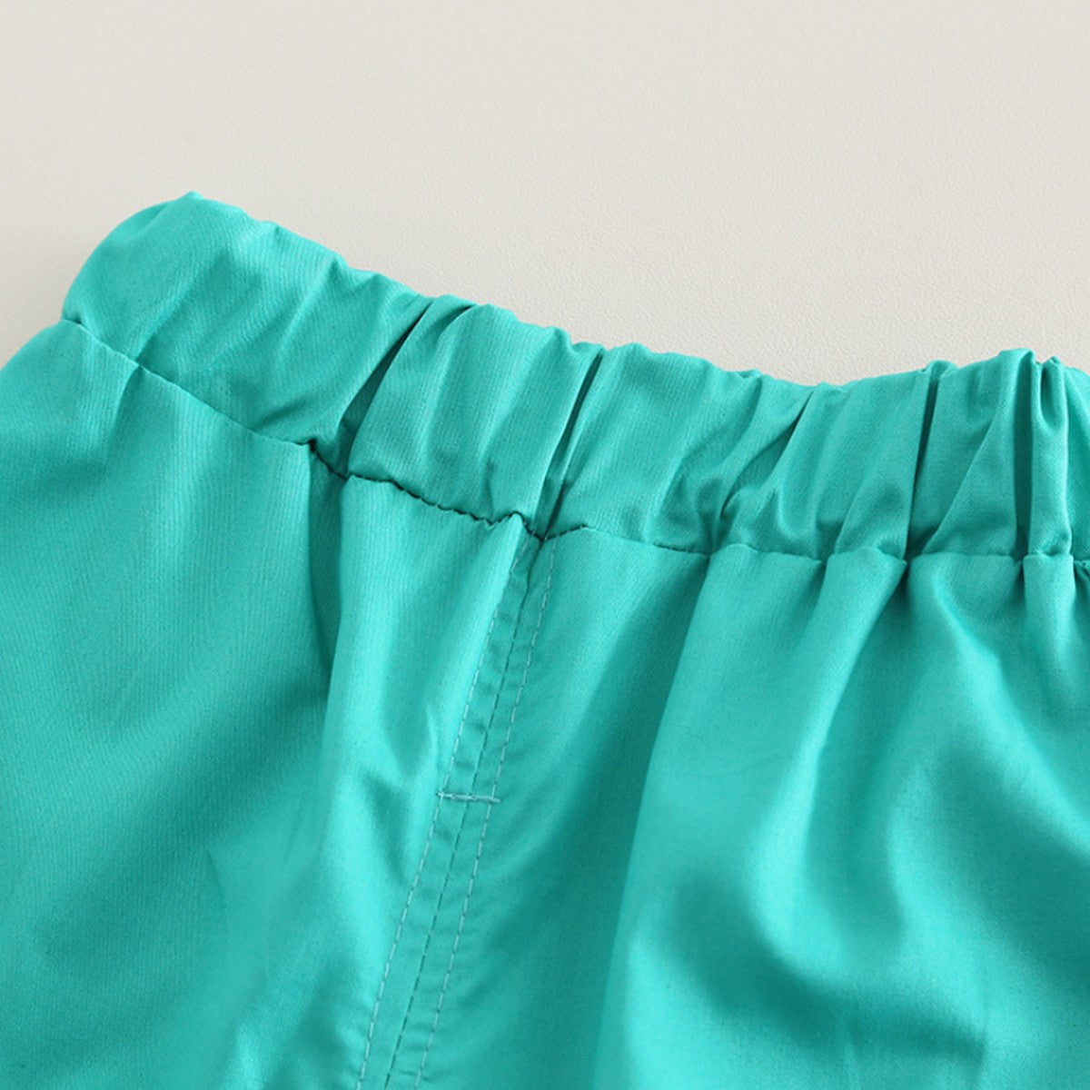 1-5 Yaş Turkuaz ‘HI’ Baskılı Tişört ve Cepli Pantolon Takımı