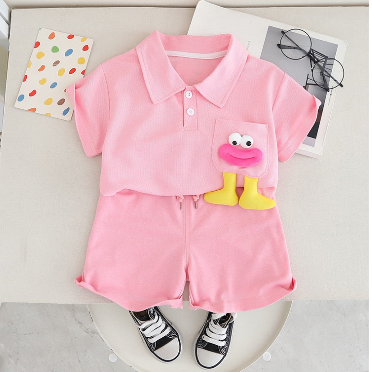 1-6 Yaş Pembe Cebinde Figürlü Polo Yaka Şort Takımı – Unisex
