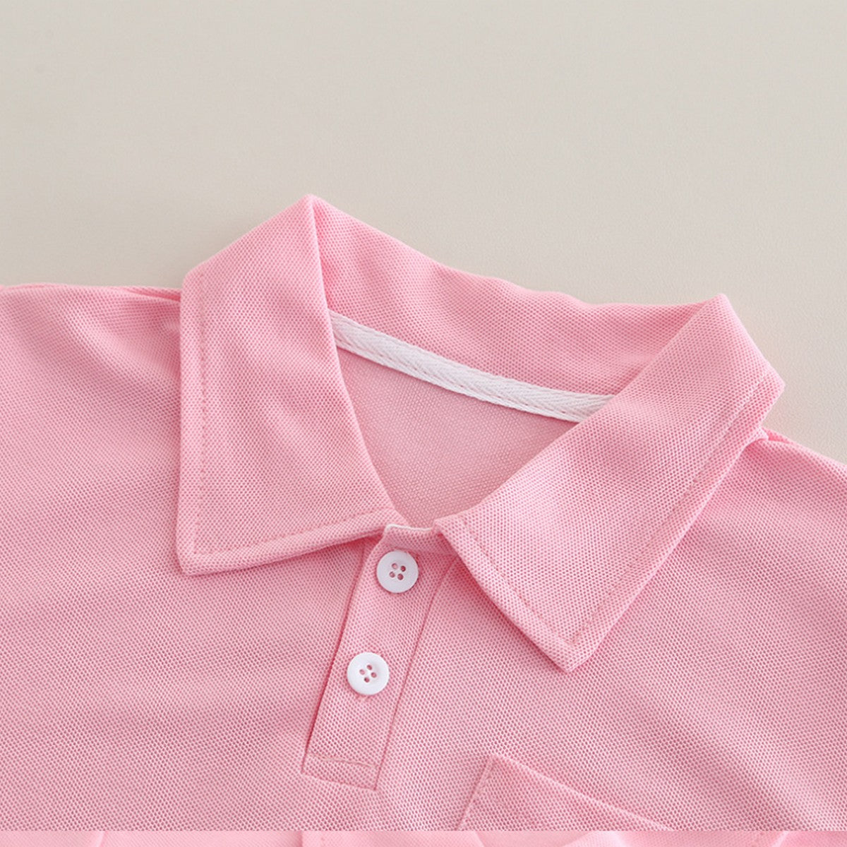 1-6 Yaş Pembe Cebinde Figürlü Polo Yaka Şort Takımı – Unisex