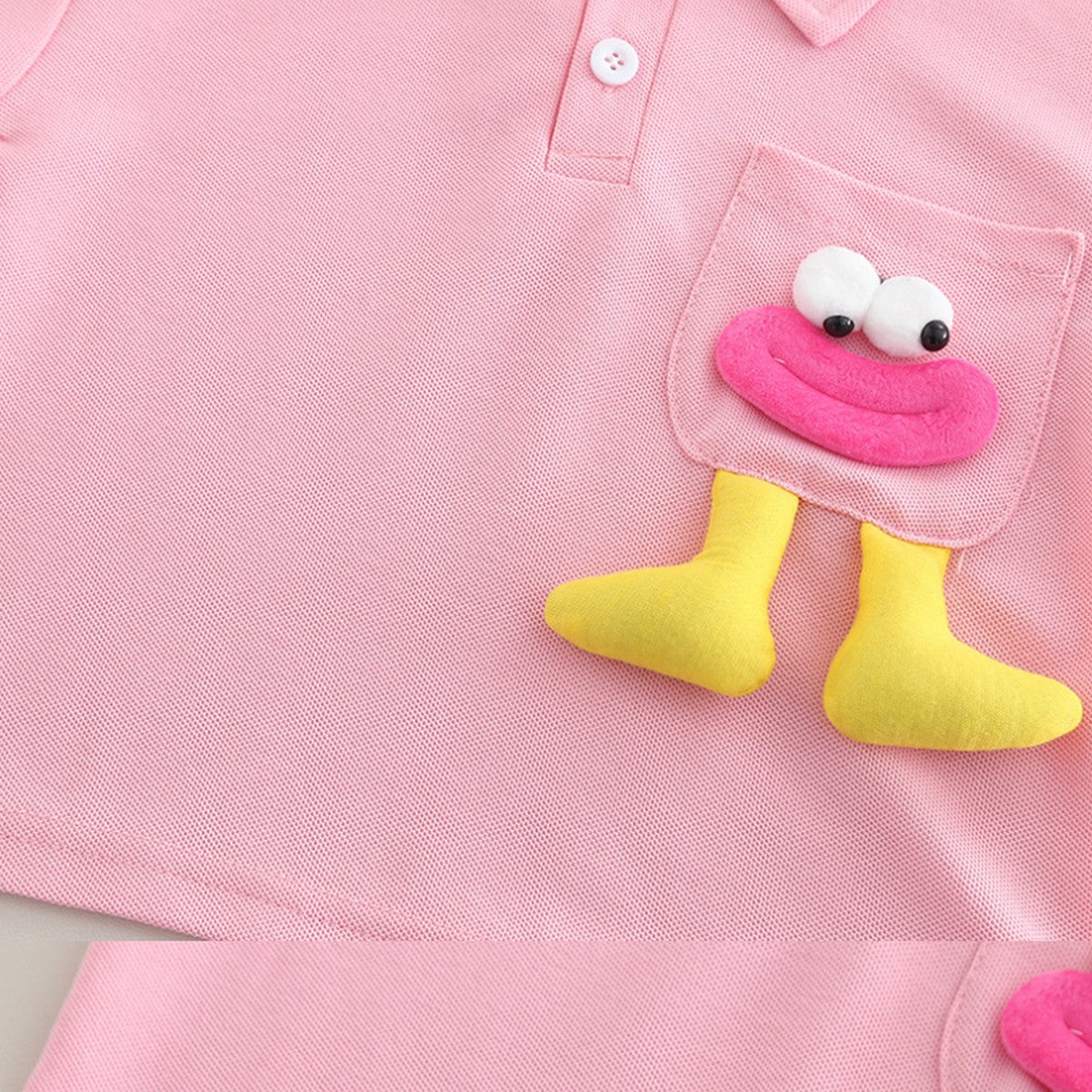 1-6 Yaş Pembe Cebinde Figürlü Polo Yaka Şort Takımı – Unisex